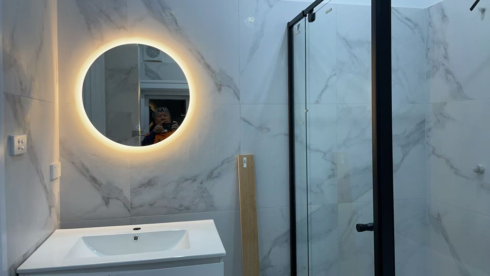 Frameless shower and modern fixtures